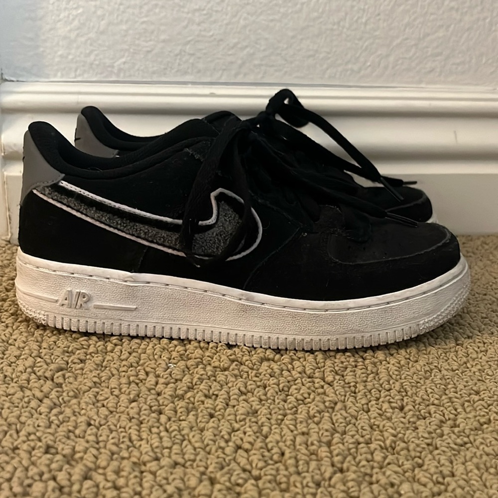 Black nike air forces with grey black and white swoosh